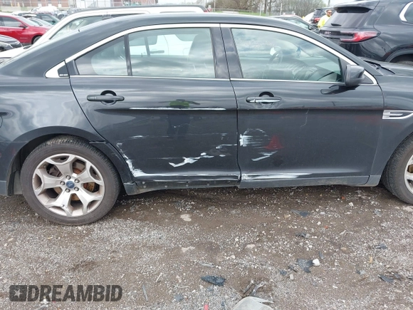 2011 Ford Taurus SHO with VIN 1FAHP2KT9BG153512, listed as a IAAI auction lot 41952063 with 230,922 mi miles and . Bid and sale history available at DreamBid. Image 6.