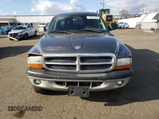 2004 Dodge Dakota Sport z VIN 1D7HG38N64S688604, wystawiony jako Copart lot #79811934 z przebiegiem 160 377 mil mil oraz Szkoda całkowita • Salvage title. Historia ofert i sprzedaży dostępna na DreamBid. Obrazek 5.