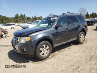 2010 Ford Escape Hybrid z VIN 1FMCU4K32AKB79563, wystawiony jako Copart lot #52892885 z przebiegiem 177 008 mil mil oraz Szkoda całkowita • Salvage title. Historia ofert i sprzedaży dostępna na DreamBid. Obrazek 1.