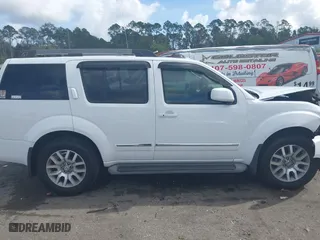 2012 Nissan Pathfinder SV with VIN 5N1AR1NN1CC616194, listed as a IAAI auction lot 40821219 with 104,698 mi miles. Bid and sale history available at carsss.com. Image 13.