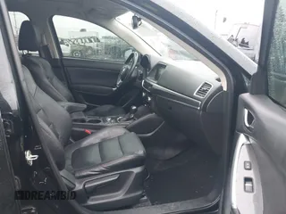 2016 Mazda CX-5 Grand Touring z VIN JM3KE4DY5G0742686, wystawiony jako IAAI lot #41598719 z przebiegiem 117 643 mil mil oraz . Historia ofert i sprzedaży dostępna na DreamBid. Obrazek 5.