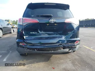 2017 Toyota RAV4 LE with VIN JTMZFREV4HJ136104, listed as a IAAI auction lot 42077699 with 120,360 mi miles and . Bid and sale history available at carsss.com. Image 6.