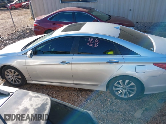 2014 Hyundai Sonata SE with VIN 5NPEC4AC0EH848726, listed as a IAAI auction lot 41747200 with 121,720 mi miles and . Bid and sale history available at DreamBid. Image 14.