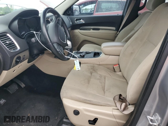 2014 Dodge Durango SXT z VIN 1C4RDJAG8EC596784, wystawiony jako Copart lot #57682215 z przebiegiem 142 008 mil mil oraz Szkoda całkowita • Salvage title. Historia ofert i sprzedaży dostępna na DreamBid. Obrazek 7.