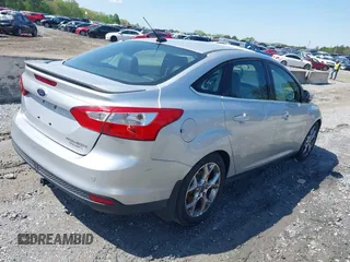 2014 Ford Focus Titanium with VIN 1FADP3J27EL227261, listed as a IAAI auction lot 41972536 with 172,470 mi miles. Bid and sale history available at carsss.com. Image 4.