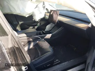 2020 Tesla Model 3 Standard Range Plus z VIN 5YJ3E1EA0LF739011, wystawiony jako IAAI lot #41379792 z przebiegiem Nie podano mil oraz . Historia ofert i sprzedaży dostępna na DreamBid. Obrazek 5.