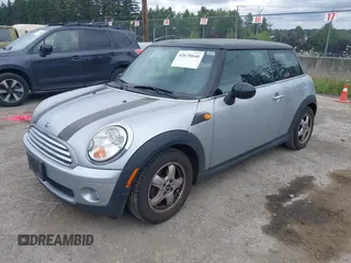 2007 MINI Hardtop with VIN WMWMF33557TU61953, listed as a IAAI auction lot 42678840 with 139,665 mi miles and . Bid and sale history available at DreamBid. Image 2.