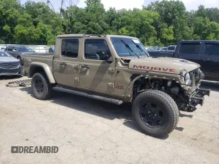 2020 Jeep Gladiator Mojave с VIN 1C6JJTEG7LL202871, выставлен на аукционе Copart как лот 57490545 с пробегом 101 747 миль миль и Списание • Salvage title. История ставок и продаж доступна на DreamBid. Изображение 4.