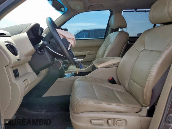 2013 Honda Pilot Touring with VIN 5FNYF3H90DB030323, listed as a Copart auction lot 57914985 with 226,792 mi miles and Salvage title. Bid and sale history available at DreamBid. Image 7.