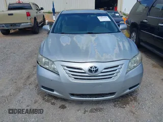 2007 Toyota Camry CE z VIN 4T1BE46K47U586629, wystawiony jako IAAI lot #42434797 z przebiegiem 261 964 mil mil oraz . Historia ofert i sprzedaży dostępna na DreamBid. Obrazek 6.