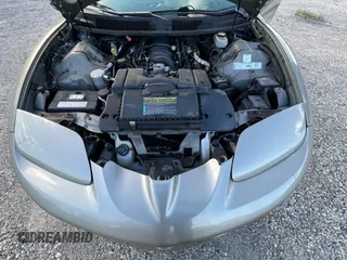1999 Pontiac Firebird Formula with VIN 2G2FV22G1X2205745, listed as a Copart auction lot 65841425 with 142,913 mi miles and Clean title. Bid and sale history available at DreamBid. Image 7.