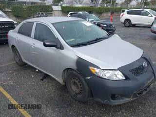 2009 Toyota Corolla with VIN 1NXBU40E39Z146748, listed as a IAAI auction lot 41523817 with 223,552 mi miles. Bid and sale history available at carsss.com. Image 1.