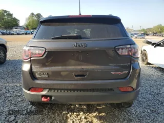 2019 Jeep Compass Trailhawk with VIN 3C4NJDDB5KT722026, listed as a Copart auction lot 52824885 with 105,727 mi miles and Salvage title. Bid and sale history available at DreamBid. Image 6.