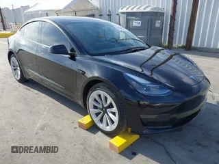 2021 Tesla Model 3 Standard Range Plus z VIN 5YJ3E1EA7MF937392, wystawiony jako IAAI lot #42033887 z przebiegiem Nie podano mil oraz . Historia ofert i sprzedaży dostępna na DreamBid. Obrazek 1.