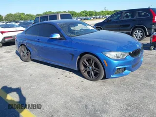 2015 BMW 4 Series 428i xDrive z VIN WBA3N9C57FK247763, wystawiony jako IAAI lot #41783892 z przebiegiem 158 813 mil mil oraz . Historia ofert i sprzedaży dostępna na DreamBid. Obrazek 1.