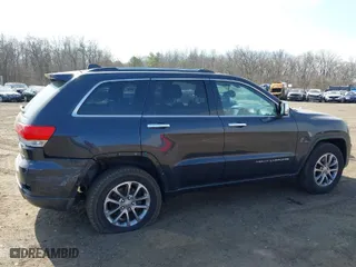 2015 Jeep Grand Cherokee Limited with VIN 1C4RJFBG0FC820717, listed as a IAAI auction lot 41781708 with 137,652 mi miles. Bid and sale history available at carsss.com. Image 17.