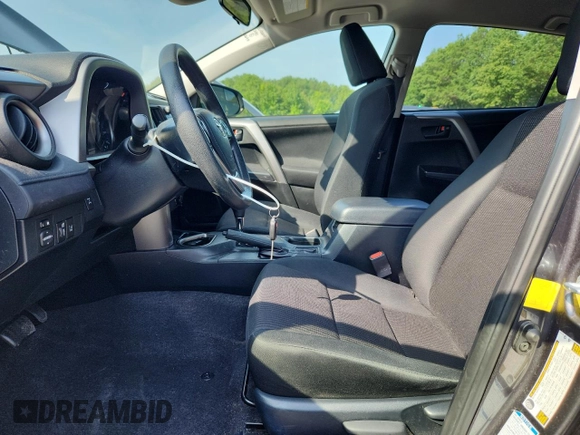 2017 Toyota RAV4 LE with VIN JTMBFREV5HJ146464, listed as a Copart auction lot 61841125 with 125,365 mi miles and Salvage title. Bid and sale history available at DreamBid. Image 7.