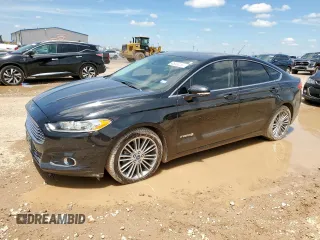 2013 Ford Fusion SE Hybrid z VIN 3FA6P0LU0DR267560, wystawiony jako Copart lot #60563415 z przebiegiem 140 998 mil mil oraz Czysty tytuł • Clean title. Historia ofert i sprzedaży dostępna na DreamBid. Obrazek 1.