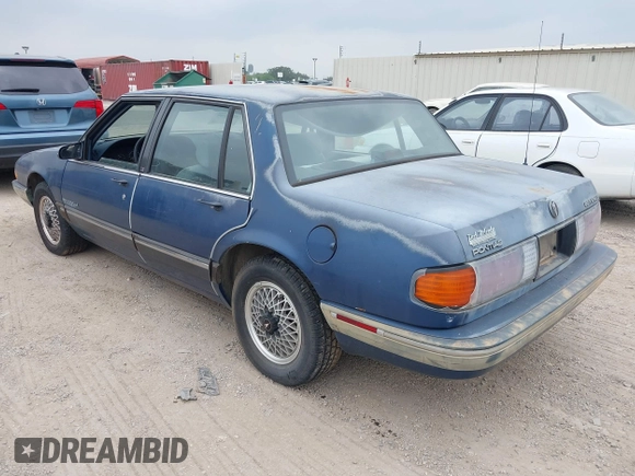 1990 Pontiac Bonneville z VIN 1G2HX54C6L1204370, wystawiony jako IAAI lot #42283309 z przebiegiem 114 427 mil mil oraz . Historia ofert i sprzedaży dostępna na DreamBid. Obrazek 3.