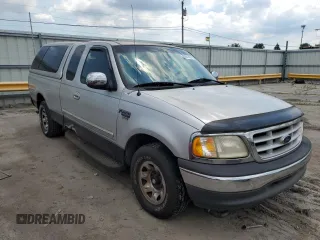 1999 Ford F-250 with VIN 1FTRX27LXXNC18863, listed as a Copart auction lot 63051395 with 118,695 mi miles and Clean title. Bid and sale history available at DreamBid. Image 4.