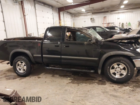 2001 Toyota Tundra SR5 with VIN 5TBRT34131S169696, listed as a IAAI auction lot 41481456 with 215,679 mi miles and . Bid and sale history available at DreamBid. Image 13.