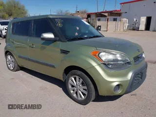 2012 Kia Soul + with VIN KNDJT2A64C7419796, listed as a IAAI auction lot 41883584 with 114,551 mi miles. Bid and sale history available at carsss.com. Image 1.