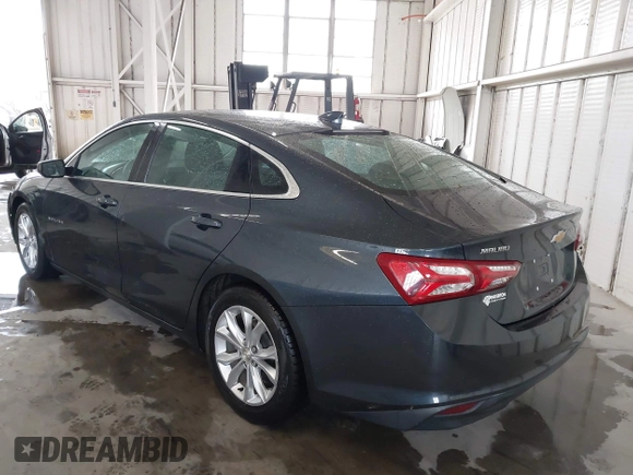 2020 Chevrolet Malibu LT with VIN 1G1ZD5STXLF052438, listed as a IAAI auction lot 42006000 with 140,513 mi miles and . Bid and sale history available at DreamBid. Image 3.