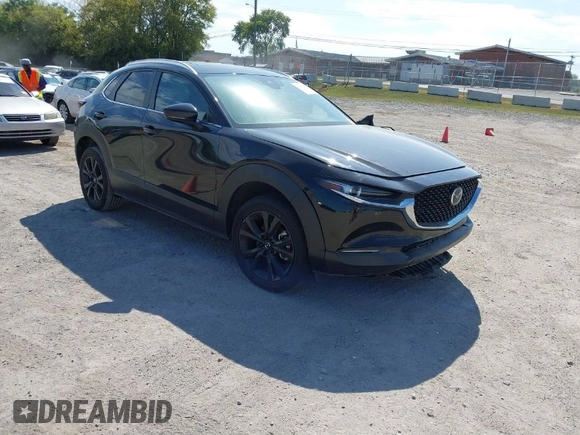 2022 Mazda CX-30 2.5 Turbo with VIN 3MVDMBAY4NM452705, listed as a IAAI auction lot 40101452 with 18,873 mi miles and . Bid and sale history available at DreamBid. Image 1.