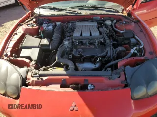 1999 Mitsubishi 3000GT z VIN JA3AM44H2XY001614, wystawiony jako Copart lot #77580444 z przebiegiem 128 948 mil mil oraz Tytuł czysty. Historia ofert i sprzedaży dostępna na DreamBid. Obrazek 11.