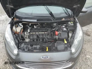 2019 Ford Fiesta SE z VIN 3FADP4EJ8KM127915, wystawiony jako Copart lot #45153775 z przebiegiem 99 494 mil mil oraz Szkoda całkowita • Salvage title. Historia ofert i sprzedaży dostępna na DreamBid. Obrazek 13.
