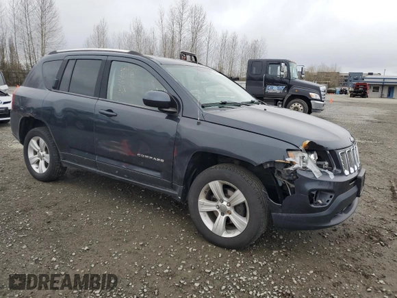 2014 Jeep Compass Latitude with VIN 1C4NJDEB4ED601769, listed as a Copart auction lot 48901365 with 129,826 mi miles and Salvage Title. Bid and sale history available at carsss.com. Image 4.