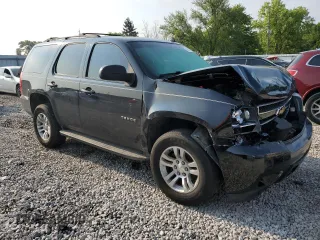 2013 Chevrolet Tahoe LS with VIN 1GNSKAE00DR200886, listed as a Copart auction lot 75326444 with 200,383 mi miles and Salvage title. Bid and sale history available at DreamBid. Image 4.