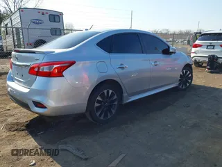 2018 Nissan Sentra S with VIN 3N1AB7AP1JY217456, listed as a IAAI auction lot 41647997 with 141,179 mi miles and . Bid and sale history available at DreamBid. Image 4.