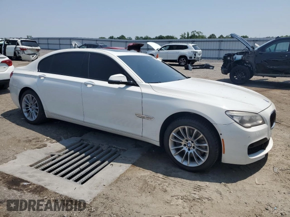 2013 BMW 7 Series 750Li with VIN WBAYE8C55DD133309, listed as a Copart auction lot 60656455 with 182,562 mi miles and Salvage title. Bid and sale history available at DreamBid. Image 4.