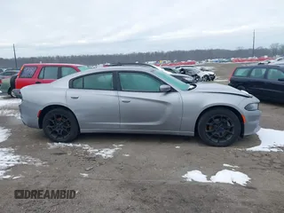 2015 Dodge Charger SXT z VIN 2C3CDXJGXFH891493, wystawiony jako IAAI lot #41316110 z przebiegiem 161 281 mil mil oraz . Historia ofert i sprzedaży dostępna na DreamBid. Obrazek 13.