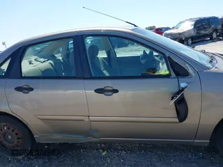 2005 Ford Focus S with VIN 1FAFP34N35W248234, listed as a IAAI auction lot 42543408 with 143,786 mi miles and . Bid and sale history available at DreamBid. Image 14.