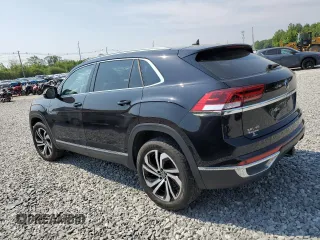 2023 Volkswagen Atlas SEL with VIN 1V2BE2CA1PC216733, listed as a Copart auction lot 59392255 with 28,011 mi miles and Salvage title. Bid and sale history available at DreamBid. Image 2.