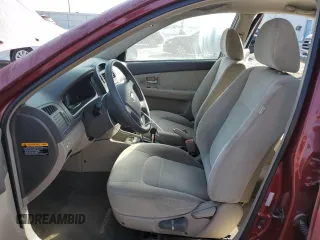 2007 Kia Spectra EX with VIN KNAFE121775427693, listed as a Copart auction lot 76727994 with 100,197 mi miles and Salvage Title. Bid and sale history available at carsss.com. Image 7.