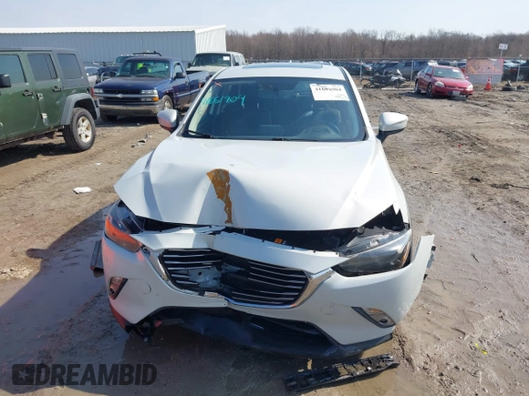 2016 Mazda CX-3 Grand Touring with VIN JM1DKFD76G0134205, listed as a IAAI auction lot 41661904 with 190,368 mi miles. Bid and sale history available at carsss.com. Image 12.