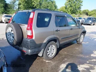 2005 Honda CR-V EX with VIN SHSRD78865U314431, listed as a IAAI auction lot 40206182 with 164,015 mi miles. Bid and sale history available at carsss.com. Image 4.