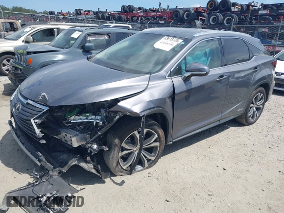 2016 Lexus RX 450h z VIN 2T2BGMCAXGC005914, wystawiony jako IAAI lot #42156530 z przebiegiem 94 050 mil mil oraz . Historia ofert i sprzedaży dostępna na DreamBid. Obrazek 2.