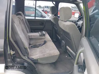 1999 Isuzu Trooper S with VIN JACDJ58X5X7902821, listed as a IAAI auction lot 40762329 with 182,773 mi miles and . Bid and sale history available at DreamBid. Image 8.