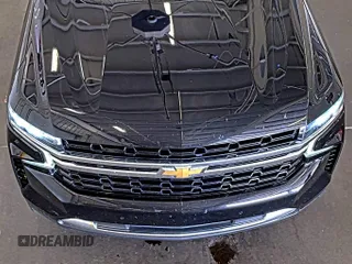 2022 Chevrolet Tahoe LS z VIN 1GNSKMKD7NR129745, wystawiony jako IAAI lot #42566236 z przebiegiem 95 126 mil mil oraz . Historia ofert i sprzedaży dostępna na DreamBid. Obrazek 29.