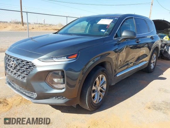 2019 Hyundai Santa Fe SE with VIN 5NMS23AD2KH134016, listed as a IAAI auction lot 41977240 with 61,448 mi miles and . Bid and sale history available at DreamBid. Image 2.