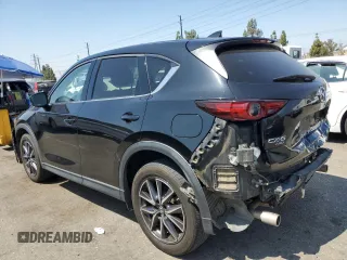 2018 Mazda CX-5 Grand Touring with VIN JM3KFBDM4J0348165, listed as a Copart auction lot 62733665 with 80,693 mi miles and Salvage title. Bid and sale history available at DreamBid. Image 2.