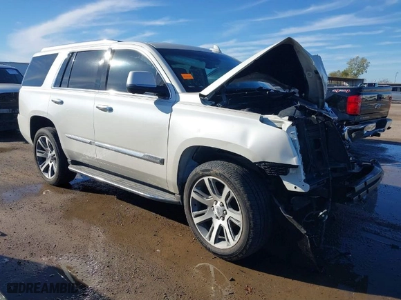 2015 Cadillac Escalade Luxury with VIN 1GYS3MKJXFR651714, listed as a IAAI auction lot 41205449 with 129,066 mi miles. Bid and sale history available at carsss.com. Image 1.