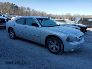 2009 Dodge Charger Police with VIN 2B3KA43TX9H587594, listed as a Copart auction lot 86266084 with 215,829 mi miles and Salvage Title. Bid and sale history available at DreamBid. Image 4.