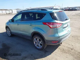 2013 Ford Escape SEL with VIN 1FMCU9HX2DUA71931, listed as a IAAI auction lot 41757318 with 149,344 mi miles. Bid and sale history available at carsss.com. Image 3.