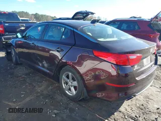 2015 Kia Optima LX with VIN 5XXGM4A79FG384762, listed as a IAAI auction lot 40919391 with 183,379 mi miles. Bid and sale history available at carsss.com. Image 3.