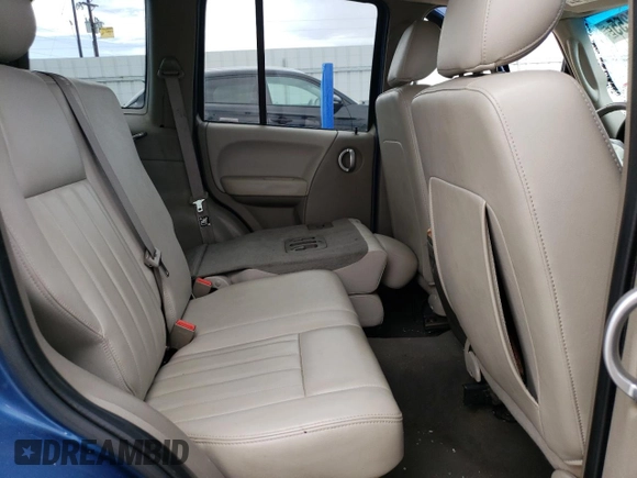 2006 Jeep Liberty Limited z VIN 1J4GL58K16W164947, wystawiony jako Copart lot #57055255 z przebiegiem Nie podano mil oraz Szkoda całkowita • Salvage title. Historia ofert i sprzedaży dostępna na DreamBid. Obrazek 11.
